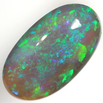 SOLID BLACK CRYSTAL OPAL Bright and sparkling green and turquoise purple fire